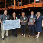 Special award for excellence from Erie and a donation to NCS
